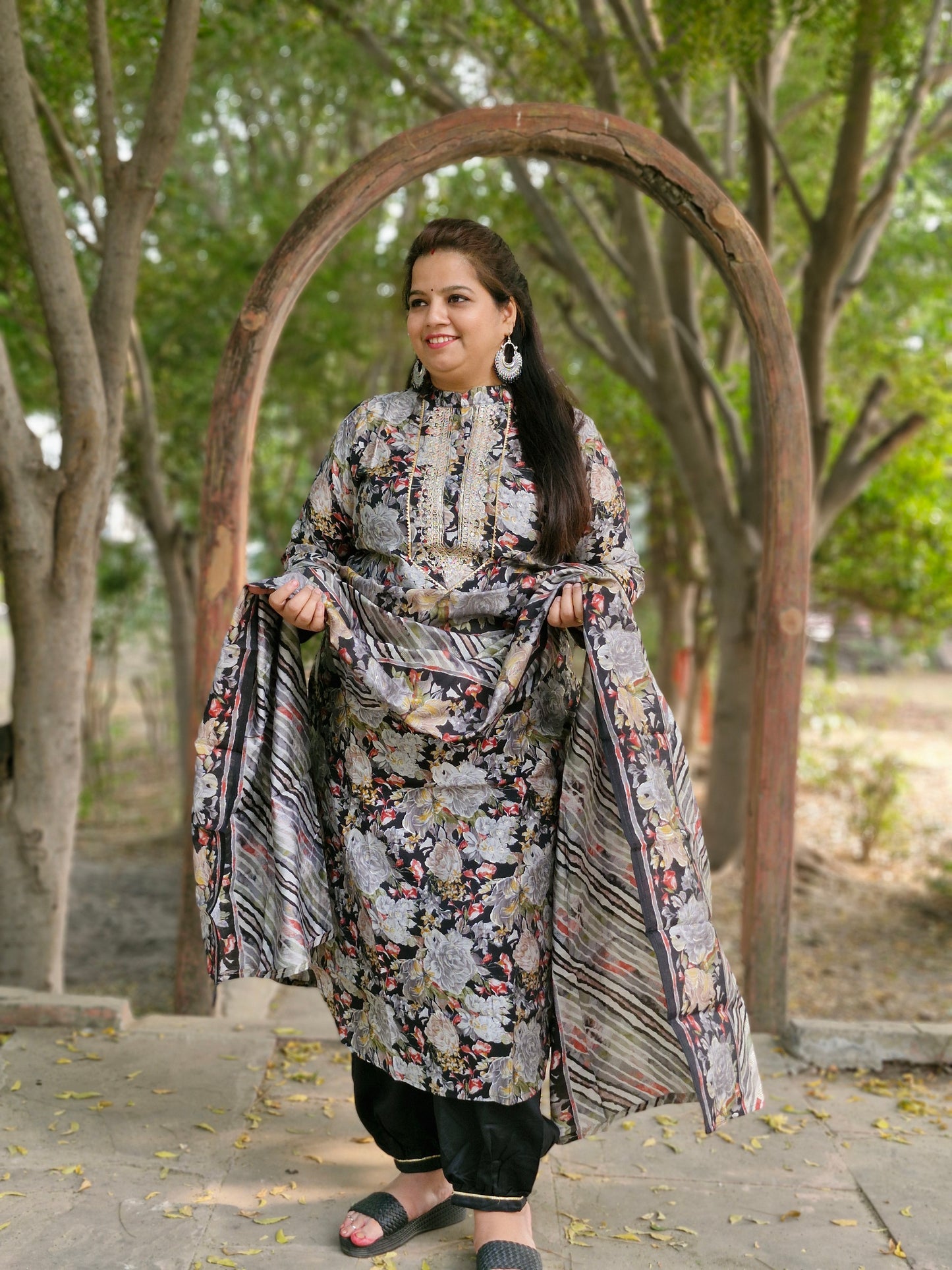 Black Floral Print Suit with Embroidered Neckline and Striped Dupatta